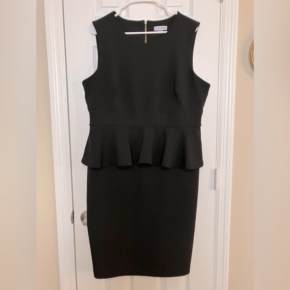 Calvin Klein black flounce waist dress.